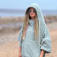 Beach Poncho Wrap yourself in luxury with our Beach Poncho, made from 100% high-quality cotton terry. This premium material is not only incredibly soft to the touch but also quick-drying, ensuring you stay comfortable whether you're fresh out of the water or just lounging by the pool. Design & Fit: - One-size-fits-all design, effortlessly adaptable for all body types, making it ideal for families or couples who love to share. With its unisex, relaxed fit, this poncho allows for easy movement and Beach Poncho, Running On The Beach, Poncho Wrap, Pool Design, Beach Essentials, Soothing Colors, Indoor Activities, Beach Days, Ponchos