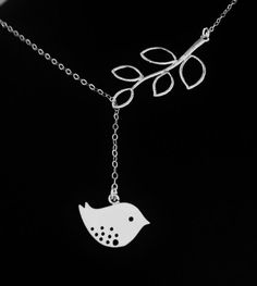 "Beautiful bird and branch necklace in sterling silver  cable chain with silver  lovester clasp in the back  The birds measure1 1/2 12-17mm silver plated and  the branch is 3/4\" by 19x40mm rhodium plated   The total lengths of the necklace 17inches inches long,  you may choose any length upto 19inches at the time of check out  if you need any help or have any  question please convo me.   please read the shop policie before you buy  And visit my  etsy shop@http://etsy.com/shop/elegantjewelry12" Elegant Silver Necklace With Bird Shape, Sterling Silver Bird Necklace, Silver Bird-shaped Sterling Silver Necklace, Adjustable Silver Jewelry With Bird Design, Silver Bird Necklace, Necklace Tree, Branch Necklace, Silver Bird, Bird Necklace