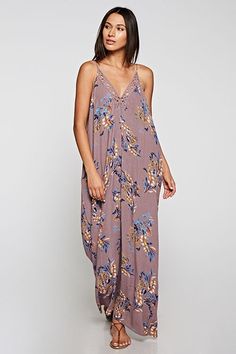 Are You Summer Ready? A beautiful and versatile sleeveless maxi dress in a floral print. Featuring adjustable spaghetti straps, an oversize cocoon fit, an embroidered trim v neckline, and side pockets. Great Resort Wear! Stay Sexy! Fabric: 100% Rayon Floral Embroidered V-neck Maxi Dress For Brunch, Floral Embroidered V-neck Maxi Dress, Casual V-neck Maxi Dress With Floral Embroidery, Summer Floral Embroidered V-neck Maxi Dress, V-neck Maxi Dress With Floral Embroidery For Vacation, Sleeveless Maxi Dress For Spring Loungewear, Sleeveless Spring Maxi Loungewear Dress, Printed V-neck Maxi Dress For Daywear, Casual Maxi Dress With Spaghetti Straps For Loungewear