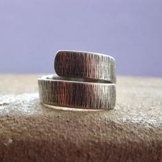 Handmade partially oxidised sterling silver adjustable wrap textured ring. The ring has been hammered for a modern texture. This design is adjustable in order to tighten gently squeeze the ring and to widen simply pull to open. However, I suggest to specify your correct ring size during the checkout in a note to a seller, so I can adjust the ring for you. This ring can also be worn on your thumb and it looks great with absolutely anything. The ring is available in silver, oxidised silver and par Modern Texture, Fan Earrings, Textured Ring, Circle Necklace, Oxidized Silver, Oxidized Sterling Silver, Beautiful Gift Boxes, Jewelry Gift Box, Silver Band