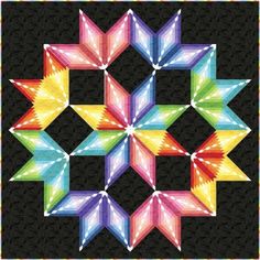 an image of a star quilt pattern on a black background with the colors of rainbows