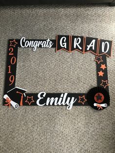 this is an image of a graduation photo frame with congratulations and grad on it