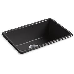 an empty black sink on a white background