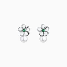 Indulge in the luxurious elegance of our Pearl Flower Studs. Adorned with charming green gemstone inlaid flowers, these sophisticated earrings will elevate any outfit to a whole new level. Make a statement with these exclusive studs that are sure to turn heads and leave a lasting impression. Detail： -Material: 14k gold/silver plated with internal brass -S925 silver needle -Gauge: 20g | 0.8mm -Dimensions: 14mm Length x 9.6mm Width -Closure: rubber backings -Include: a pair * Get inspired: 365 day Elegant Green Flower Earrings For Formal Occasions, Elegant Green Flower Earrings, Green Flower Charm Earrings, Elegant Green Flower Shaped Jewelry, Elegant Green Flower-shaped Jewelry, Elegant Green Flower Earrings For Wedding, Green Flower Earrings For Wedding, Elegant Flower Jewelry For May Birthstone, Elegant Green Flower Earrings For Gift