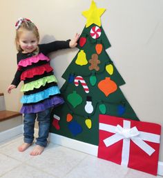 Felt Christmas Tree for kids with * oRNaMeNTS * LiGHTS * a STaR * and * a PReSeNT SToRaGe BaG Felt Christmas Tree For Kids, Christmas Tree For Kids, Bless Our Nest, Preschool Craft Activities, Trees For Kids, Christmas Party Crafts, Diy Felt Christmas Tree, Christmas Trees For Kids, Felt Tree