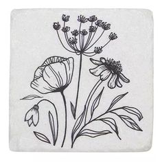 a black and white drawing of flowers on a square stone coaster with the words, wildflowers