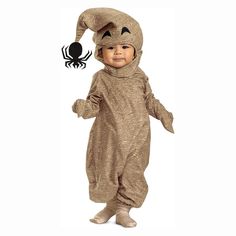 a baby dressed in a costume with a spider on it's head