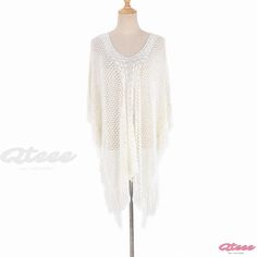 Qteee - Knitted Hollow Edge Beach Cover-up: Perfect Swimwear Outer Layer for Beachside Vacations and Sun Protection White Crochet Top For The Beach, White Crochet Yarn Top For The Beach, Knitted Summer Beach Sweater, Beach Spring Knitted Sweater, Spring Beach Knitted Sweater, Knitted Stretch Sweater For Vacation, White Stretch Sweater For Vacation, Bohemian Stretch Sweater For Beach, Bohemian Stretch Sweater For The Beach