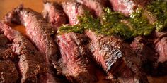 steak and broccoli on a wooden cutting board