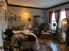 a bed room with a neatly made bed and lots of lights