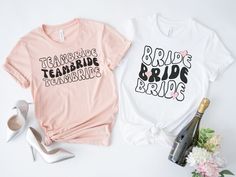 two t - shirts that say bride and team brides on them next to high heel shoes