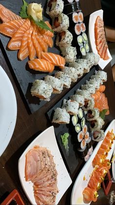 sushi platter with various types of meats and vegetables