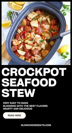 the seafood stew is ready to be eaten in the crockpot and served with lemons