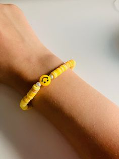 yellow bead bracelet for a happy day, if you want to express yourself out you can wear it in a sunny day, or just wear it to remind you to be happy. Cheap Cheerful Smiley Face Bracelets, Cheap Cute Smiley Face Beaded Bracelets, Cheap Yellow Stretch Bracelet With Letter Beads, Cheap Handmade Yellow Friendship Bracelets, Yellow Bead Bracelet, Bear Activities, Smiley Bracelet, Preppy Bracelets, Yellow Bracelet