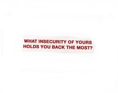 a red sticker that says, what insecity of yours holds you back the most?