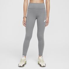 There's a reason we call these our Classic leggings. A staple for everyday wear, they're made from fabric that's thick but still lightweight, peachy-soft but still strong. Plus, they stretch with your every move and feature a high-waisted design to help you stay comfortably covered. Nike Legging, Grey Nike Leggings, Gray Nike, Classic Girl, Nike Leggings, Girls High, High Waisted Leggings, Nike Sportswear, Polyester Spandex