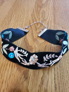 "16\" Vintage Black Choker Necklace with Embroidered Flowers and Birds with Rhinestone accents.  Excellent condition.  Clasp is functional. I sell vintage items.  Keep in mind they range in age from 1938-2003.  Due to being vintage, there may be some slight imperfections which add to the character. You get exactly what is pictured.  Please look over the pictures closely and I will be happy to answer any questions before purchase." Vintage Embellished Jewelry For Gifts, Embroidery Choker, Vintage Choker Necklace, Embroidered Necklace, Black Choker Necklace, Vintage Choker, Embroidered Tablecloth, Vintage Tablecloths, Dream Style