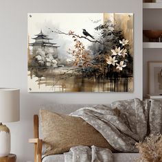 a living room scene with focus on the couch and wall art hanging over the sofa