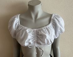 "White Dirndl Blouse Crop Dirndl Top Vintage Snow White Blouse Cropped Blouse Women Short Sleeve Trachten Tyrolean Blouse Austrian Top  Label size: 38 Measurements (lying flat): Sleeve: 8\"/ 20 cm Pit to pit: 16\"/ 40.5 cm Length: 12\"/ 30 cm Condition: Great Vintage Condition Material: 50%cotton, 50%polyester Please check measurements to insure a proper fit. Remember to allow yourself some extra room for movement. You can compare these with something from your closet that fits you well. If you Vintage Snow White, Womens Waistcoat, Womens Black Vest, Blouse Crop, Dirndl Blouse, Cropped Blouse, Black Vest, Top Vintage, Extra Room