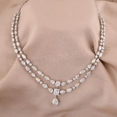 a very pretty necklace with some diamonds on it