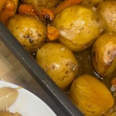 potatoes and carrots are being cooked in oil