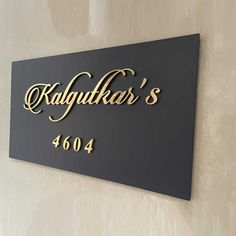 a sign that says kalgurta's on the wall