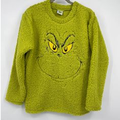 The Grinch Women's Green Sherpa Sweater Top Pullover Long Sleeve XXL NEW Dr. Seuss  - super fluffy & soft - 100% Polyester - Pullover - long sleeve - soft - fuzzy - Christmas - Xmas - Holiday - Unisex - tv, movie, cartoon  New with tags  Measurements are approximate and taken with the garment laying flat Pit to pit: 28 inches Length: 33 inches  Payment must be made at the time of purchase. If payment is not made within 24 hours the order will be canceled. After payment is received – Ships the next day when purchased Sunday-Friday, if purchased on Saturday will be shipped Monday.  I typically use USPS and get items shipped out the next business day. Please keep in mind that once I hand the package to USPS the shipping will no longer be in my control. Delays can happen on the USPS end (even Grinch Sweater, Movie Cartoon, Sherpa Sweater, American Eagle Sweater, Fuzzy Sweater, Tv Movie, The Grinch, Printed Sweater, Black Knit