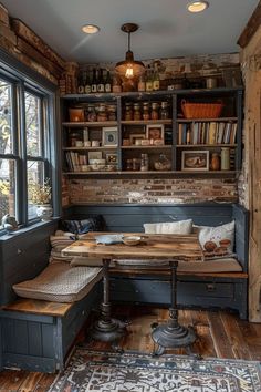 an old - fashioned kitchen with wood floors and built in bookshelves