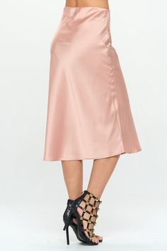 Made in USA Solid Stretch Satin Midi Skirt. Fabric content: 97% Polyester, 3% Spandex. Available in other Colors. Style: casual, formal, work Print / Pattern: solid Silhouette: pencil skirt Fit: fit Length: knee-length Lining: no Made In: Made in U.S.ASize Measurement (inch): S: 13.5 (Waist), 18.5 (Hips), 29.3 (Length) M: 14.5 (Waist), 19.5 (Hips), 29.8 (Length) L: 15.5 (Waist), 20.5 (Hips), 30.3 (Length) Feminine Formal Satin Skirt, Formal Feminine Satin Skirt, Feminine Satin Skirt For Formal Occasions, Feminine Solid Color Midi Skirt, Feminine Solid Color Skirt, Spring Date Night Satin Skirt, Feminine Party Skirt In Solid Color, Solid Satin Skirt For Workwear, Feminine Fitted Skirt For Date Night