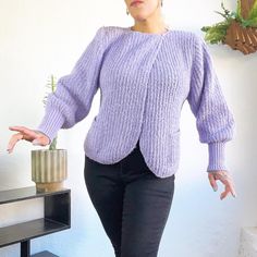 ~Follow @Shopchickaboomvintage On Instagram~ Poet Sleeves Lavender Boucle 80’s Vintage Wrap Neck Open Cardigan Sweater M/L It’s Sweater Season And This Glorious Cardigan Is Perfect For Snuggling Up By The Fire With Cocoa Or Tea. A Versatile Piece With Its Open Front And Wrap Neckline, It Can Be Worn Over Dresses, Blouses, Overalls, Tailored Slacks Or Vintage Denim! The Most Luscious Lavender Color And Perfect For Fall & Winter. Grab A Lavender Latte With The Ladies Or Go Pumpkin Picking With The Family In This Acrylic Boucle Knit. Full, Poet Sleeves With Long, Ribbed Wrists For A Fitted Look Give This Almost A Mutton Leg Sleeve Look. Two Buttons At The Neckline, Soft Shoulde Lavender Latte, 40s Style, Black Capris, Sweater Season, Pumpkin Picking, Yellow Cardigan, Purple Cardigan, 40s Fashion, Leg Sleeves