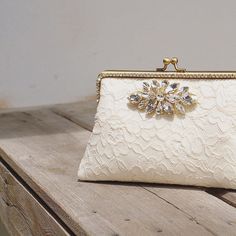 Ivory Alencon Clutch Elegant Embellished Lace Bridal Accessories, Embellished Cream Evening Bag For Wedding, Embellished Wedding Clutch, Elegant Lace Bridal Accessories For Ceremony, Elegant Lace Bridal Accessories For Formal Occasions, Formal Lace Bridal Accessories, Elegant White Clutch For Ceremony, Elegant Cream Wedding Clutch, Elegant Lace Bridal Accessories For Evening