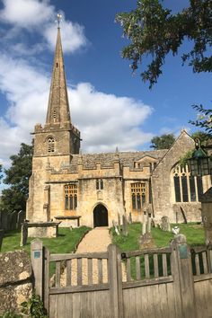 an old stone church with a steeple on top