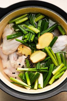 the food is prepared and ready to be cooked in the pot on the stove top