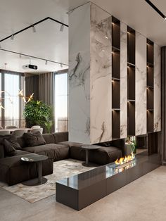 a modern living room with marble walls and flooring