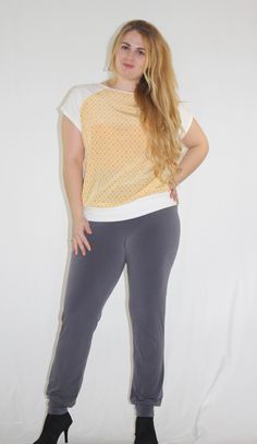 I made this lovely understated raglan sleeve top with a beautiful yellow woven printed cotton and a white cotton jersey fabric. It's relaxed fit makes it super comfortable to wear and yet so chic. It looks great worn over a pair of jeans or skirt. The top is professionally finished for durability, it's available in small, medium or large. Larger sizes can be made for an extra $20 pattern customization fee. Please specify size or simply send me your measurements in the message to the seller part Spring Raglan Sleeve T-shirt For Loungewear, Summer Stretch Raglan Sleeve Tops, Stretch Cotton Blouse For Everyday, Everyday Stretch Cotton Blouse, White Stretch Short Sleeve Top For Spring, Spring Cotton Top With Raglan Sleeves, Spring Cotton Raglan Sleeve Tops, Spring Loungewear T-shirt With Raglan Sleeves, Stretch Cotton Tops For Daywear