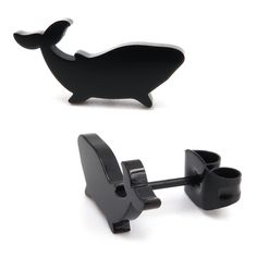 a pair of black whale shaped cufflinks