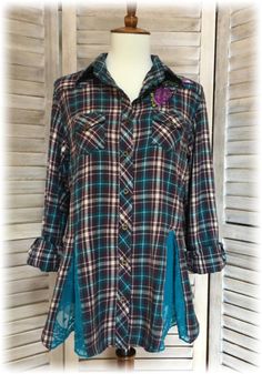 a blue and black plaid shirt on a mannequin