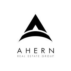 the logo for ahern real estate group, which is located in an area that has been