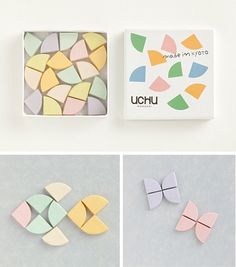 four different pictures of colorful paper butterflies in various shapes and sizes, including one with the word uohu written on it