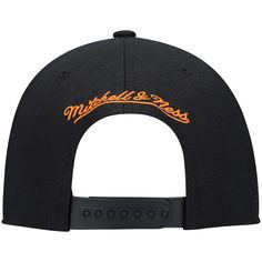 Material: 100% Polyester High Crown Flat bill Snapback Embroidered graphics Contrast-color underbill Embroidered fabric applique One size fits most Six panels with eyelets Dry clean only Officially licensed Imported Brand: Mitchell & Ness Adjustable Black Baseball Cap With Embroidered Logo, College Snapback Hat With Embroidered Logo And Curved Bill, Collegiate Adjustable Trucker Hat For Streetwear, Black Cotton Snapback Hat With Letter Print, Adjustable Trucker Hat For Streetwear Collegiate Style, Streetwear Fitted Hat With Embroidered Logo, Adjustable Curved Bill Snapback For College, Adjustable Throwback Hats For College, Throwback Adjustable Baseball Cap With Embroidered Logo