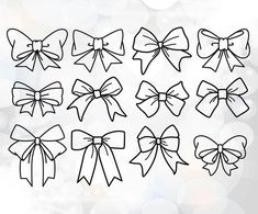 a set of nine different bows on a white background with blurry lights in the background