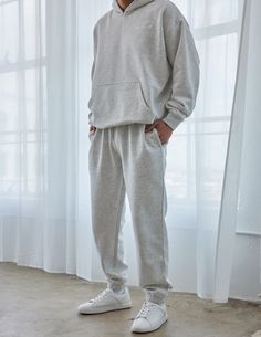 The Basics Cloud Grey Unisex Sweatpant is made with our Premium Blend Fleece and is designed to be worn year-round, made to last.    Size:  Model is 5'11" and wearing a size Large. Fit:  Relaxed, Unisex Fit Color:  Cloud Grey Composition:  70% Cotton, 30% Polyester Features:  Super Soft, Pre-Shrunk, Hidden Drawcord ,  Embroidered Logo on Left Leg Gray Tracksuit With Pockets For Loungewear, Fleece Long Pants For Loungewear, Gray Loungewear Pants With Elastic Cuffs, Gray Loungewear Bottoms With Ribbed Cuffs, Winter Joggers For Lounging, Winter Long Joggers For Lounging, Winter Loungewear Sweats, Basic Loungewear Pants With Elastic Cuffs, Sportswear Sweatpants With Pockets For Lounging