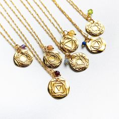 "Balance and align your chakras with this Gold Spiritual CHAKRA Necklace featuring a Hindu Symbol pendant. Regulate your body's processes and emotions with this Handmade Yoga Meditation necklace. Discover the ancient origins of the Chakras and experience the special vibrational frequency of each one. Get your own talisman necklace from Anemon, your trusted source for Hindu Spiritual Symbol amulets Jewelry. Each necklace is designed with the colors of the chakras and genuine crystals... Root Chak Hindu Symbol, Hindu Symbols, Symbol Jewelry, Vibrational Frequency, Chakra Racine, Talisman Necklace, Spiritual Symbols, Ancient Origins, Chakra Necklace