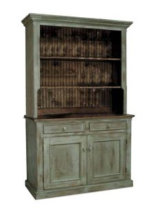 an old wooden bookcase with doors and drawers