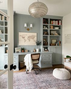 a living room filled with furniture and decor