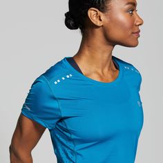 Made with our inMOTION fabric, the Endurance Shirt is designed for ultra-breathability and comfort with a lightweight fabric that moves with you during every mile—no matter how grueling your training gets. With a barely-there fabric, the only thing you’ll feel is the euphoria that comes from crossing the finish line in this women's blue athletic short sleeve shirt. Sporty Fitted Top For Light Sports, Sporty Compression Top With Light Support, Sporty Breathable Top With Athletic Fit, Sporty Breathable Athletic Fit Tops, Breathable Sportswear Tops For Light Sports, Breathable Athletic Fit Athleisure Tops, Breathable Athleisure Tops With Athletic Fit, Athletic Fit Short Sleeve Top For Light Exercise, Technical Fitted Tops For Light Sports