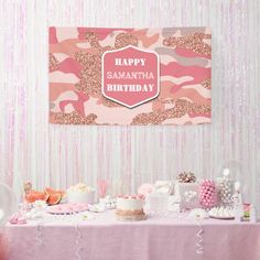 a pink camo themed birthday party with cake and desserts on a table in front of the wall