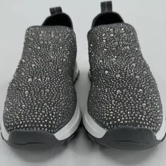 Steve Madden Nwt Gorgeous Rhinestone Bling Slip On Super Comfy Sneakers And Blingy Will Fit 7.5-8.5 Casual Silver Sparkling Sneakers, Silver Embellished Low-top Sneakers, Silver Embellished Sneakers With Round Toe, Silver Embellished Round Toe Sneakers, Silver Rhinestone Sneakers With Round Toe, Silver Bedazzled Low-top Sneakers, Silver Rhinestone Low-top Sneakers, Slip-on Synthetic Sneakers With Rhinestones, Silver Low-top Sneakers With Bling