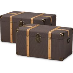 two brown suitcases sitting next to each other on a white surface with gold straps