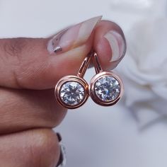 7 MM Round Cut White Moissanite Solitaire Daily Wear Earrings Set, Bezel Set Brilliant Diamond Drop Leverback Rose Gold Women Earrings Gift  ❤Custom Order Always Welcome❤ STONE DETAILS Gem Type: Moissanite Center Stone: Moissanite Stone Shape: Round Cut Stone Color: White Colorless Clarity: VVS1 Stone Wight: 2.20 Ct (Approx) (Side Stone Included) Guarantee: Test Positive & Life time Brilliance Main Stone Creation: Lab Created Durability: Tougher Than Diamond Impervious To Heat & Chemical EARRING DETAILS Metal Color : As Per Picture Metal Purity : 14k Rose Gold Style : Stud MOISSANITE DESCRIPTION Description : Moissanite Diamond Refractive Index : 2.65-2.69 2.42 Dispersion : 0.104 0.044 Luster : 20.40% 17.20% Hardness (Mohs Scale) : 9.25 10 Toughness : Excellent Excellent PAYMENT We accept White Gold Bezel Setting Drop Earrings, Round Moissanite Earrings, Formal Rose Gold Jewelry With Channel Set, Formal Rose Gold Channel Set Jewelry, Channel Set Round Cut Diamond Earrings For Anniversary, Fine Jewelry Diamond Drop Earrings With Bezel Setting, Luxury Drop Earrings With Bezel Setting, Formal Round Moissanite Earrings, Diamond White Channel Set Diamond Earrings As Gift